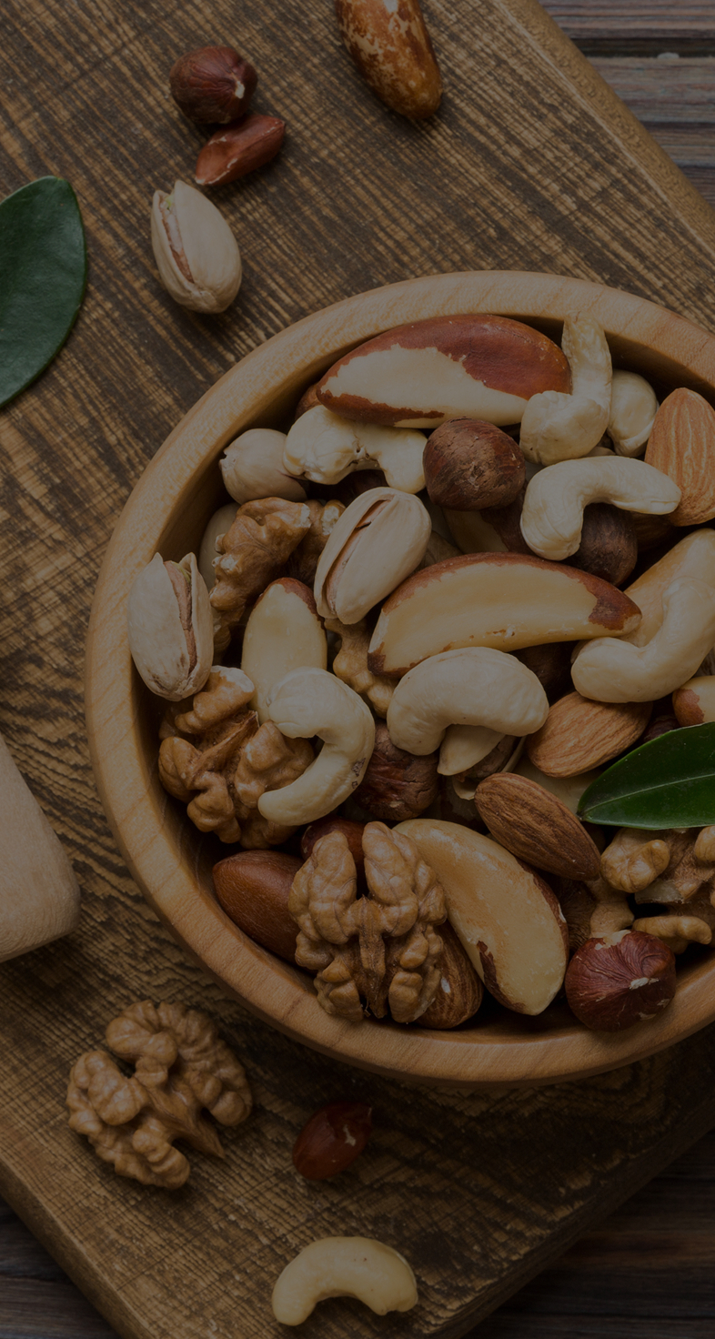 Certified Origins olive oil bottle and olives on table in olive grove Italy